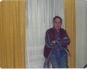 Dad_in_front_of_curtains.jpg